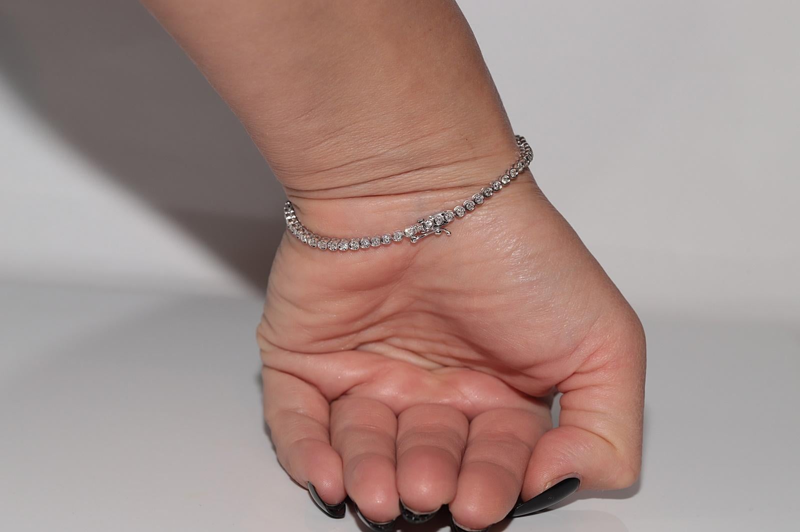 Bracciale da tennis decorato con diamanti naturali in oro 18 ct. d'epoca CIRCA 1980 in vendita 12