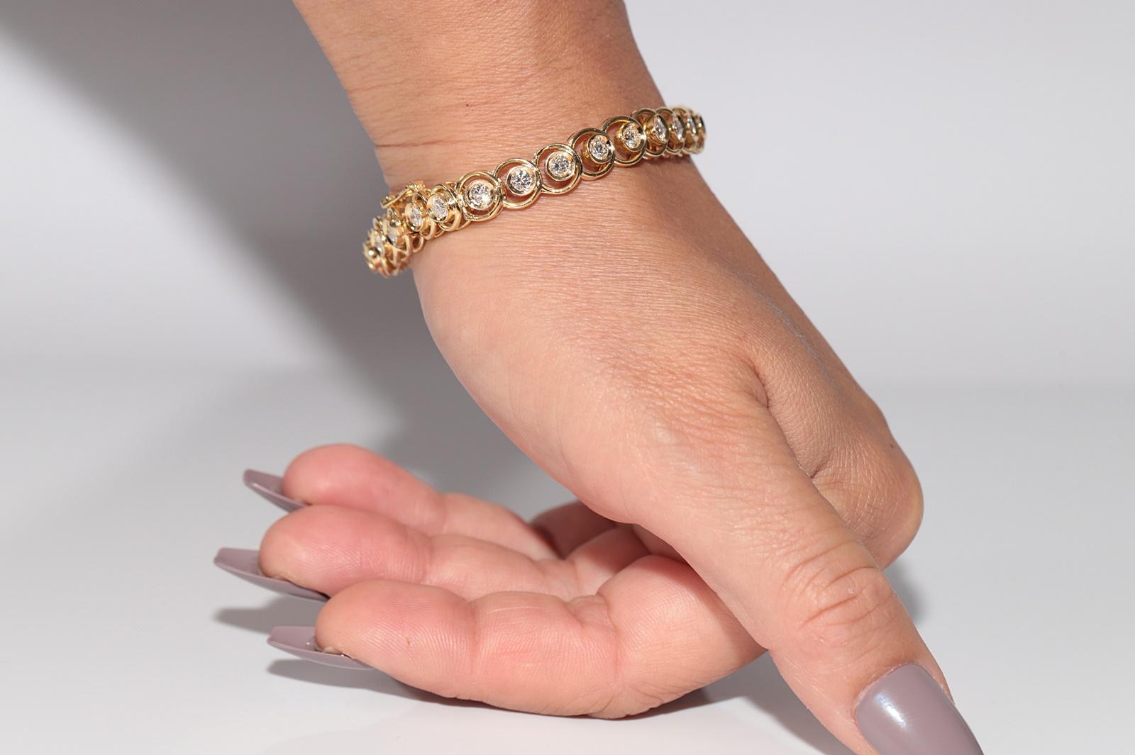 Bracciale da tennis decorato con diamanti naturali in oro 18 ct. d'epoca CIRCA 1980 in vendita 13