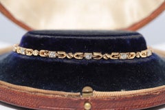 Vintage Circa 1980s 18k Gold Natural Diamond Decorated Tennis Bracelet