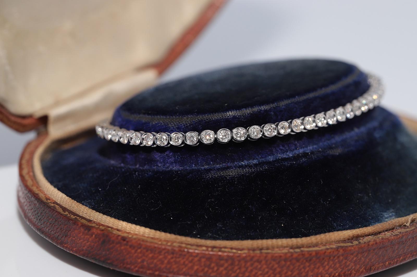 Artigiano Bracciale da tennis decorato con diamanti naturali in oro 18 ct. d'epoca CIRCA 1980 in vendita