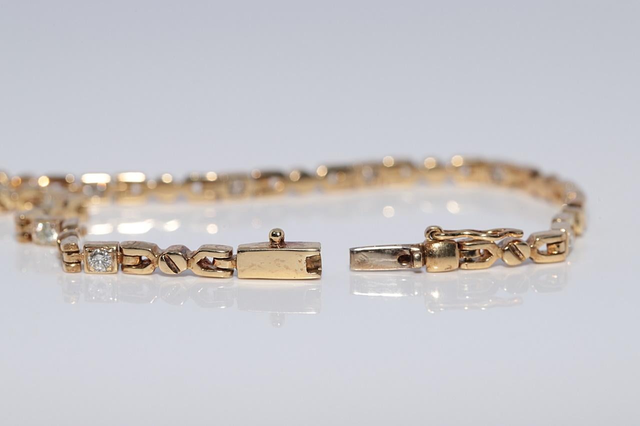 Bracciale da tennis decorato con diamanti naturali in oro 18 ct. d'epoca CIRCA 1980 in vendita 1