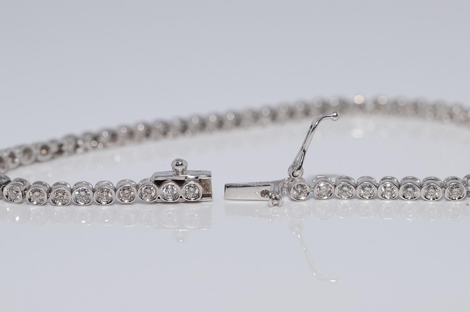 Bracciale da tennis decorato con diamanti naturali in oro 18 ct. d'epoca CIRCA 1980 in vendita 2