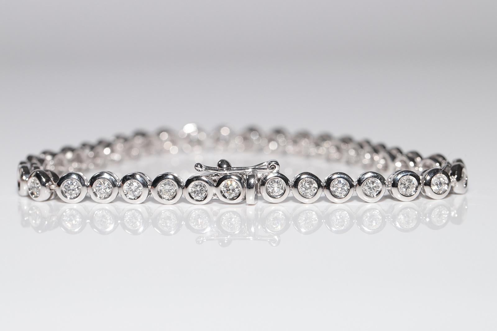 Bracciale da tennis decorato con diamanti naturali in oro 18 ct. d'epoca CIRCA 1980 in vendita 3