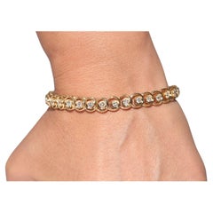 Vintage Circa 1980 Bracelet de tennis en or 18k orné de diamants naturels