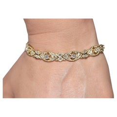 Vintage Circa 1980 Bracelet de tennis en or 18k orné de diamants naturels