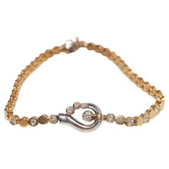 Vintage Circa 1980s 18k Gold Natural Diamond Decorated Tennis Bracelet