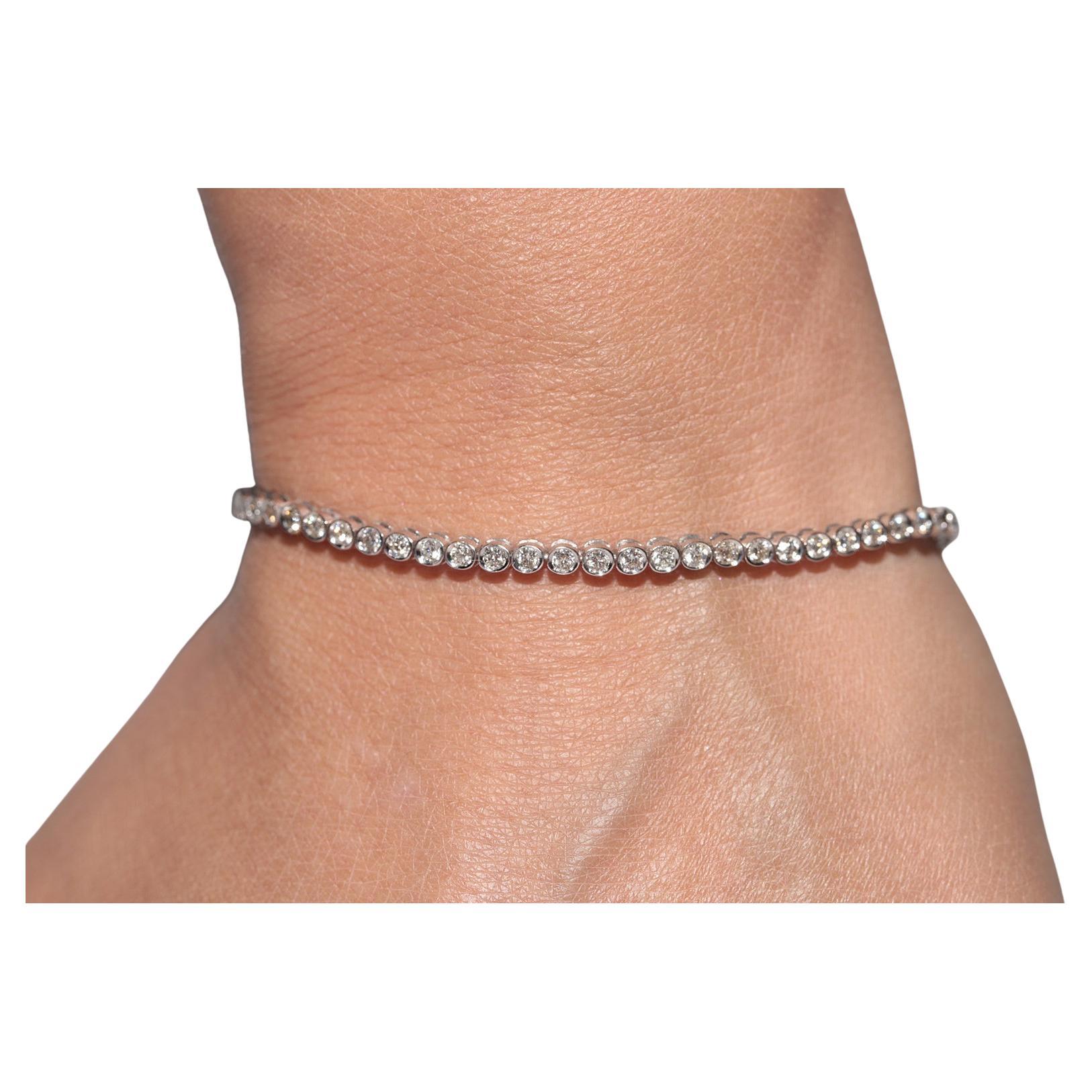 Pulsera de tenis vintage circa años 80 de oro de 18 quilates decorada con diamantes naturales