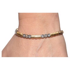 Bracciale da tennis decorato con diamanti naturali in oro 18 ct. d
epoca CIRCA 1980