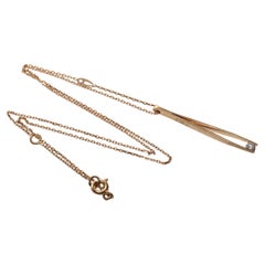 Vintage Circa 1980s 18k Gold Natural Diamond Decorated Tweezer Pendant Necklace