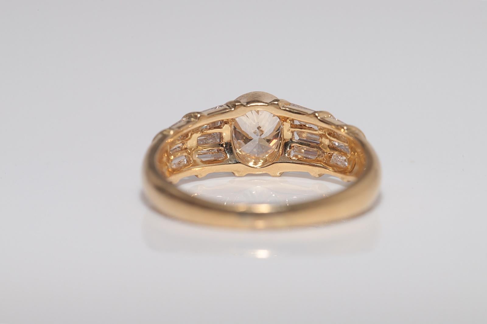 Anello con diamante naturale taglio ovale e taglio baguette in oro 18 carati, vintage, anni '80 circa in vendita 1