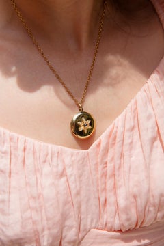 Vintage circa 1980s 9 Carat Gold Cabochon Sapphire & Diamond Locket and Chain