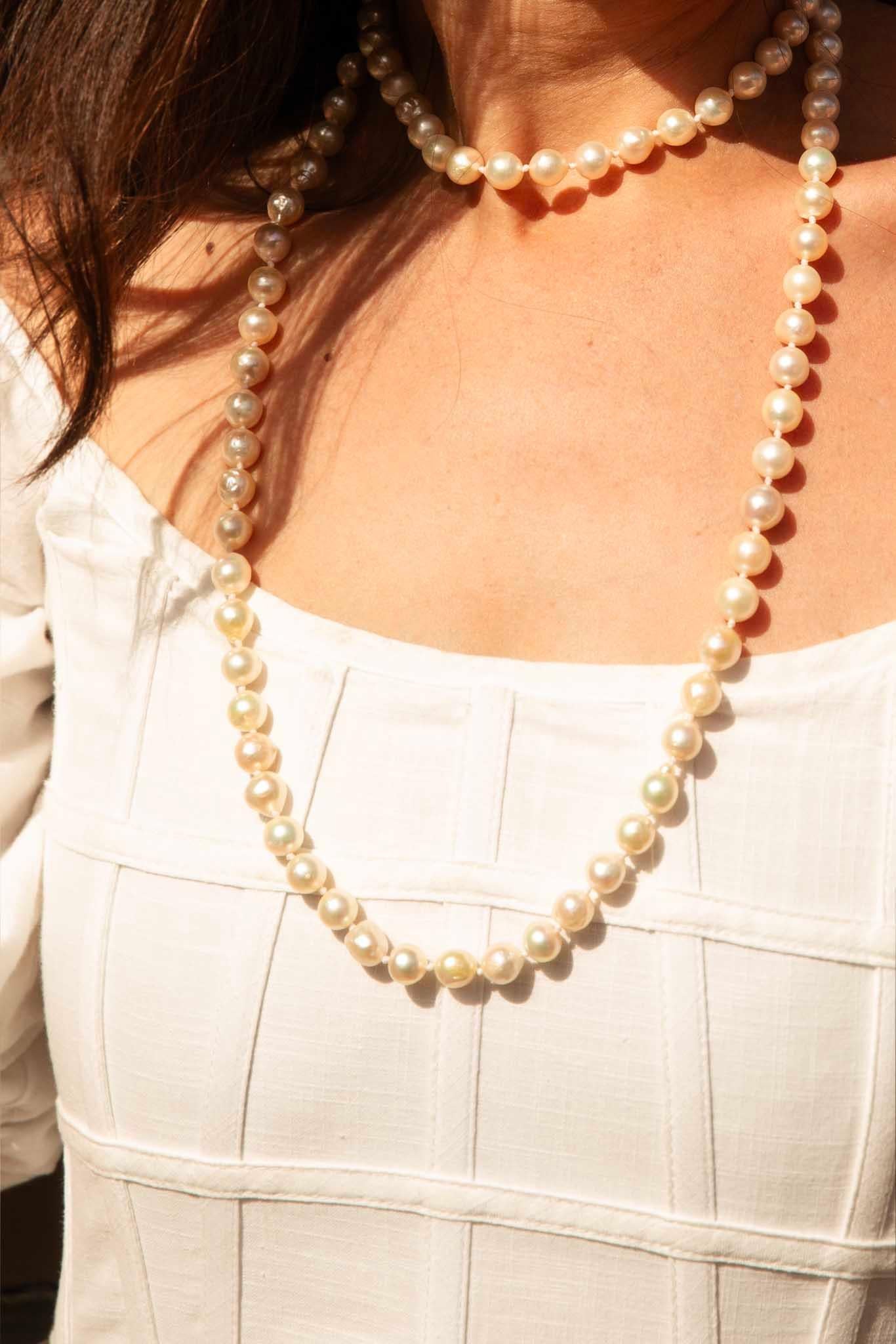 A strand of elegance, where lustrous Akoya dark cream pearls cascade gracefully, united by a delicate 18 carat gold clasp. Each pearl, a testament to the ocean’s secrets, shimmers with an ethereal glow. We have named her Angelique a message of love