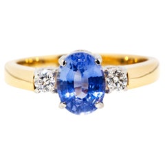 Vintage Circa 1980s Bright Blue Ceylon Sapphire and Diamond 18 Carat Gold Ring