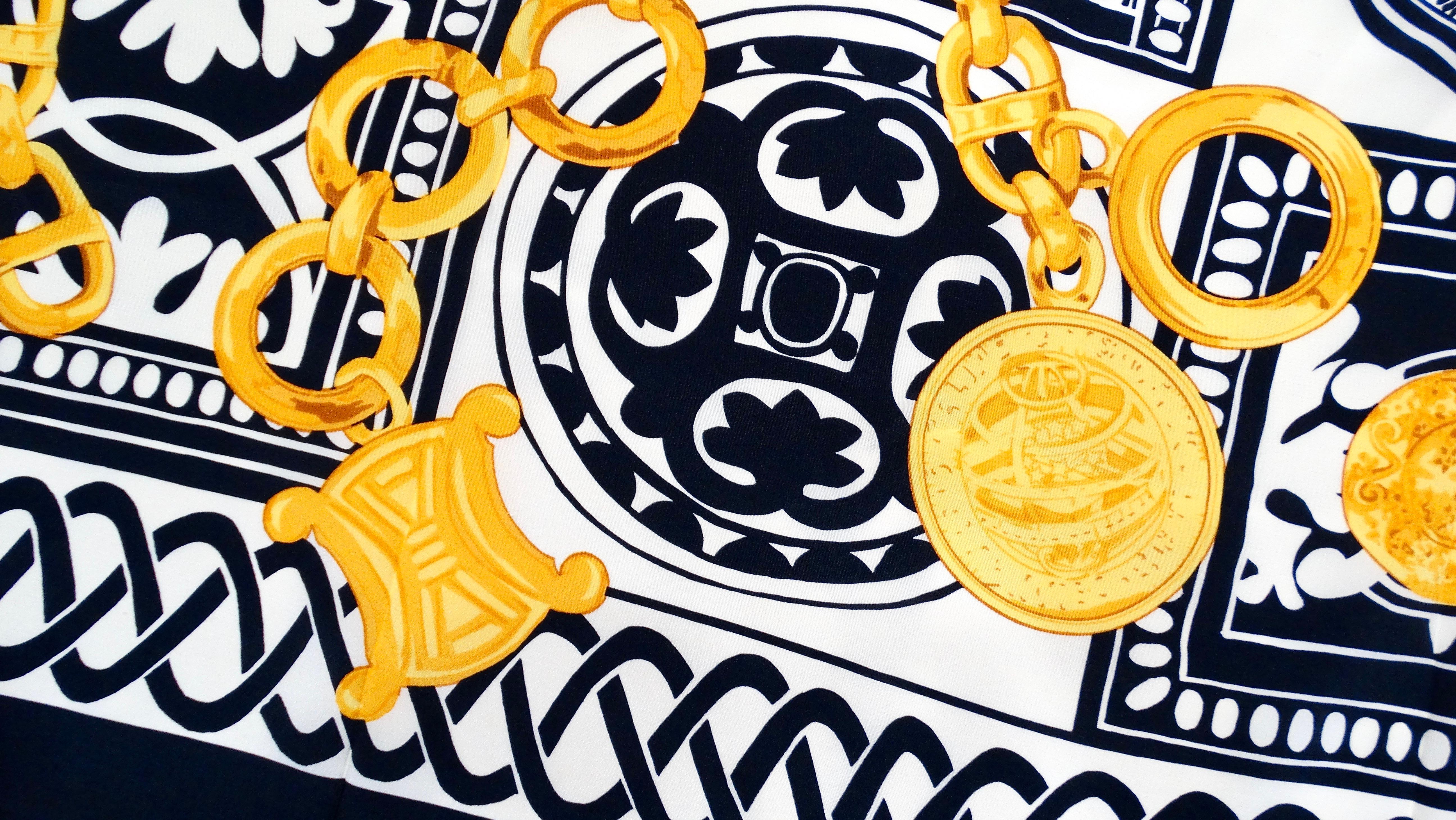 Introducing the Vintage Circa 1980s Celine Gold Chain Motif Silk Scarf, a stunning accessory that exudes elegance and timeless sophistication. Crafted from silk, this scarf showcases an iconic gold chain pattern that reflects the distinctive
