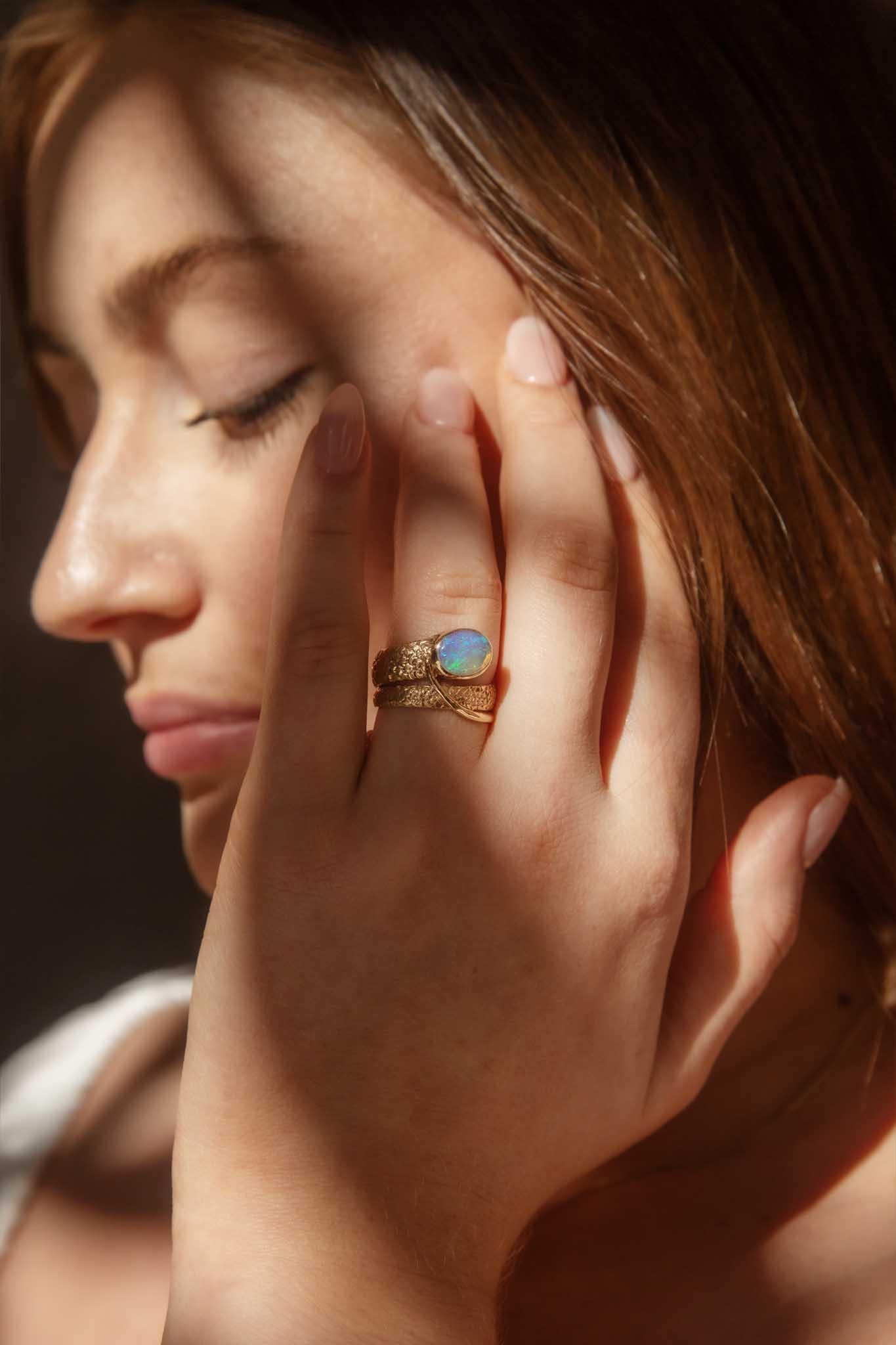 Oval Cut Vintage Circa 1980s Crystal Opal Coiled Ring 14 Carat Yellow Gold For Sale