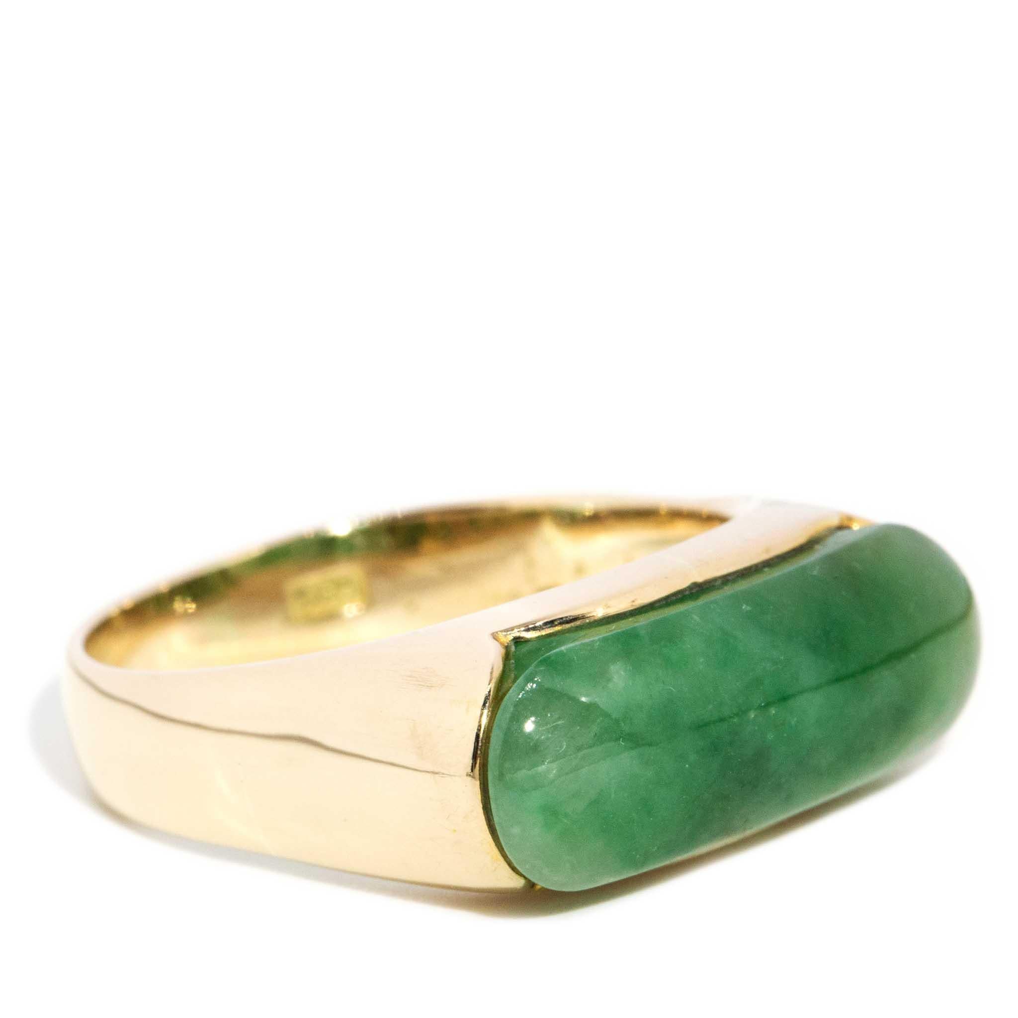 Crafted in 14 carat gold, our Desiree Ring is a handsome jewel.  Her forest green cabochon jade sits atop a band of high-polish gold. She is a simple yet impressive design that invites the wearer to be, like her, bold.

The Desiree Ring Gem