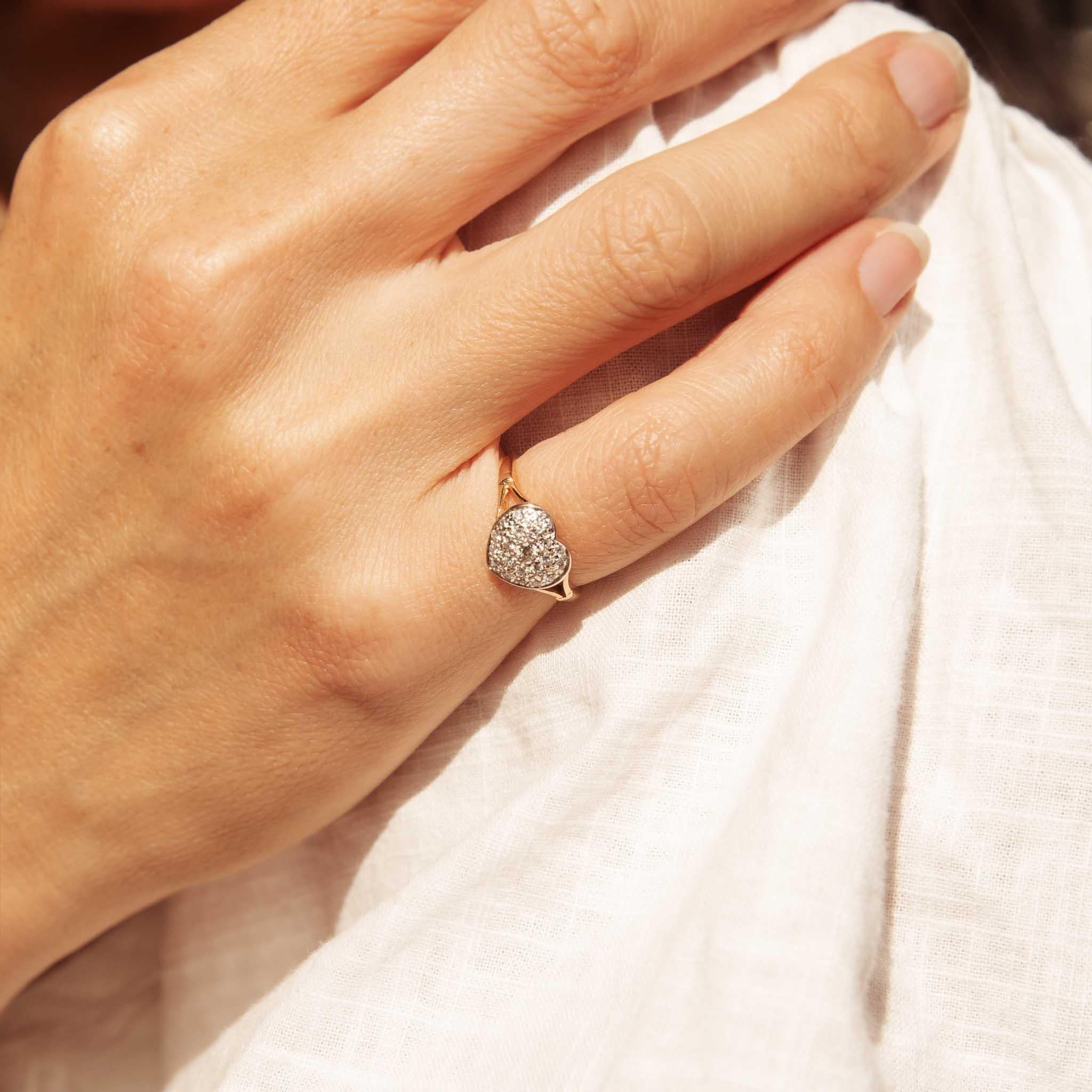 A heartfelt treasure our stunning 18-carat yellow white gold Eastly Ring is testament to eternal love. Her heart shaped design, adorned with an array of diamonds, captures the essence of romance. Each diamond like a star the night sky, sparkles with