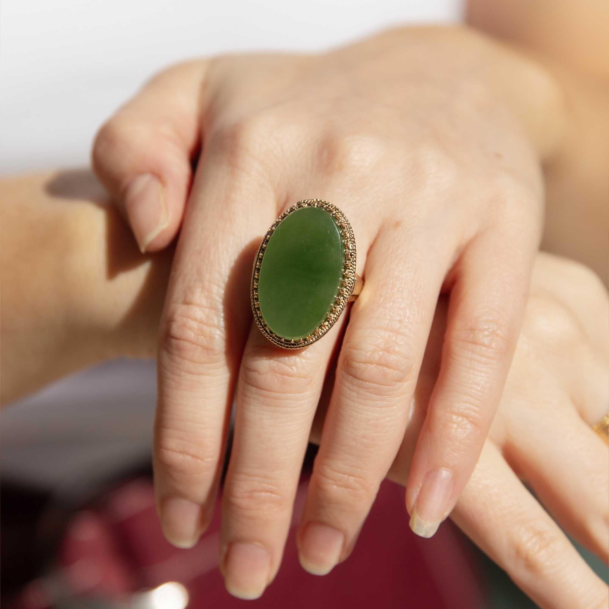 Stately and royal, Our Gwen Ring is best described in words of grandeur.  Crafted in 9 carat gold, her cabochon nephrite jade sits atop an intricately decorated basket of gold.  She is to be celebrated, a bold and abiding addition for the