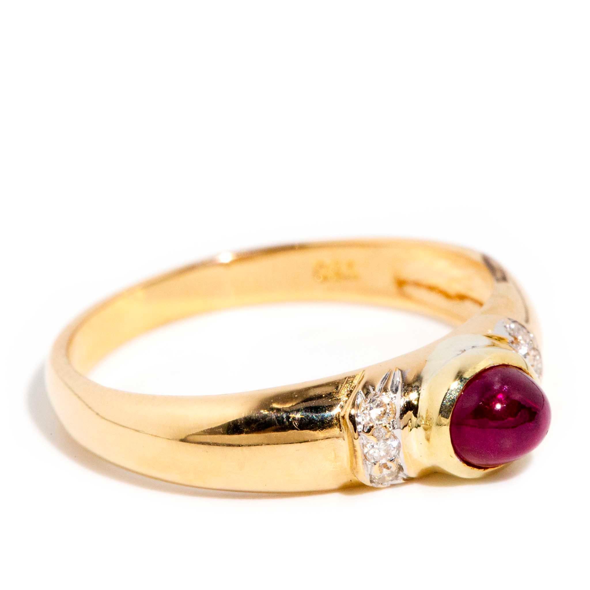 Forged in 18 carat gold, The Santina Ring is both refined and resplendent.  The gorgeous crimson of the ruby cabochon rests atop like the finest jewel in the crown.  

The Santina Ring Gem Details
The bright deep red oval ruby cabochon measures