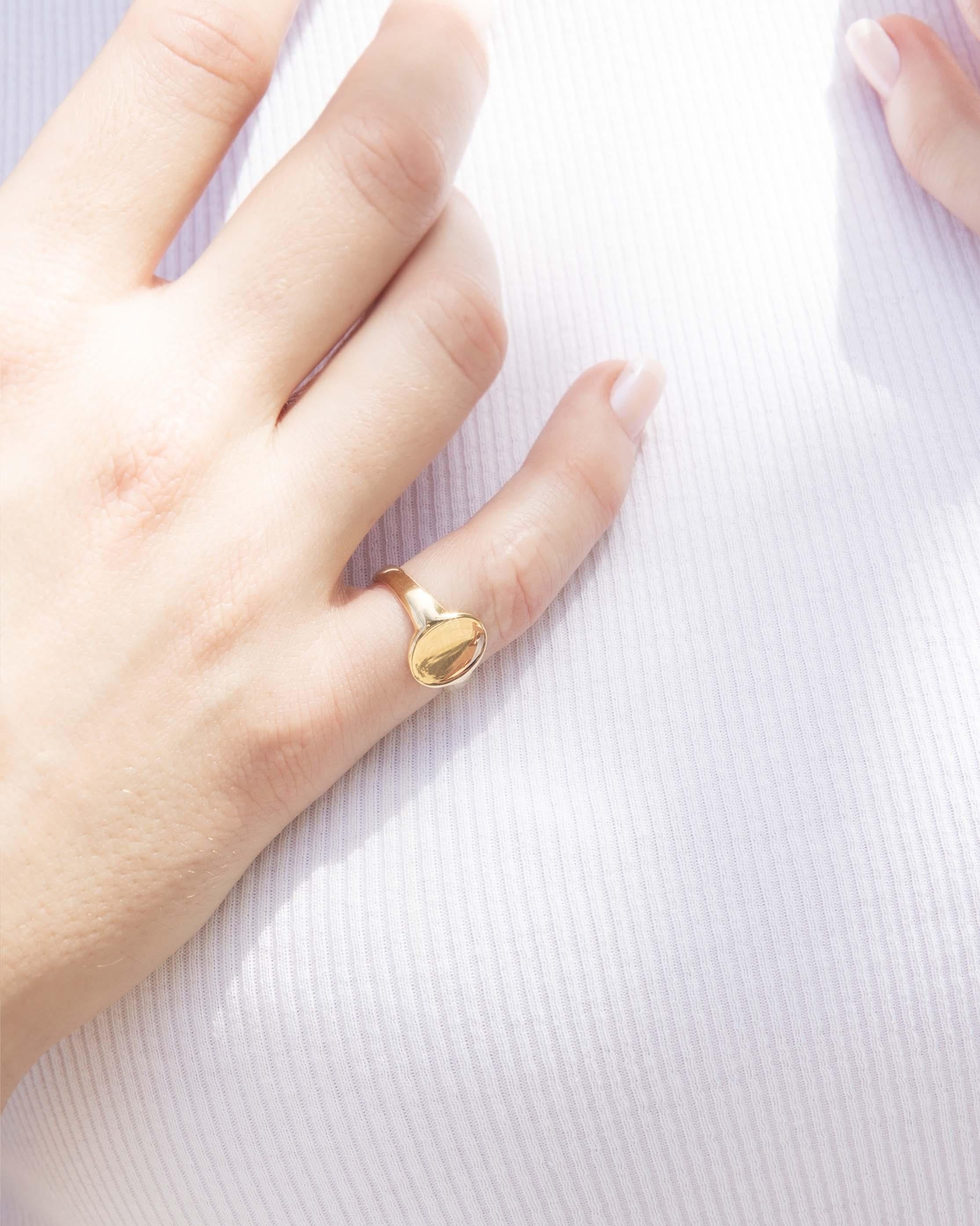 Our Tawny Ring is a blank canvas, waiting for you to engrave your family name and ensure it continues your story through generations to come. We have named her Tawny, crafted in 18 carat gold she is turning the page on her history.

Size
J 1/2