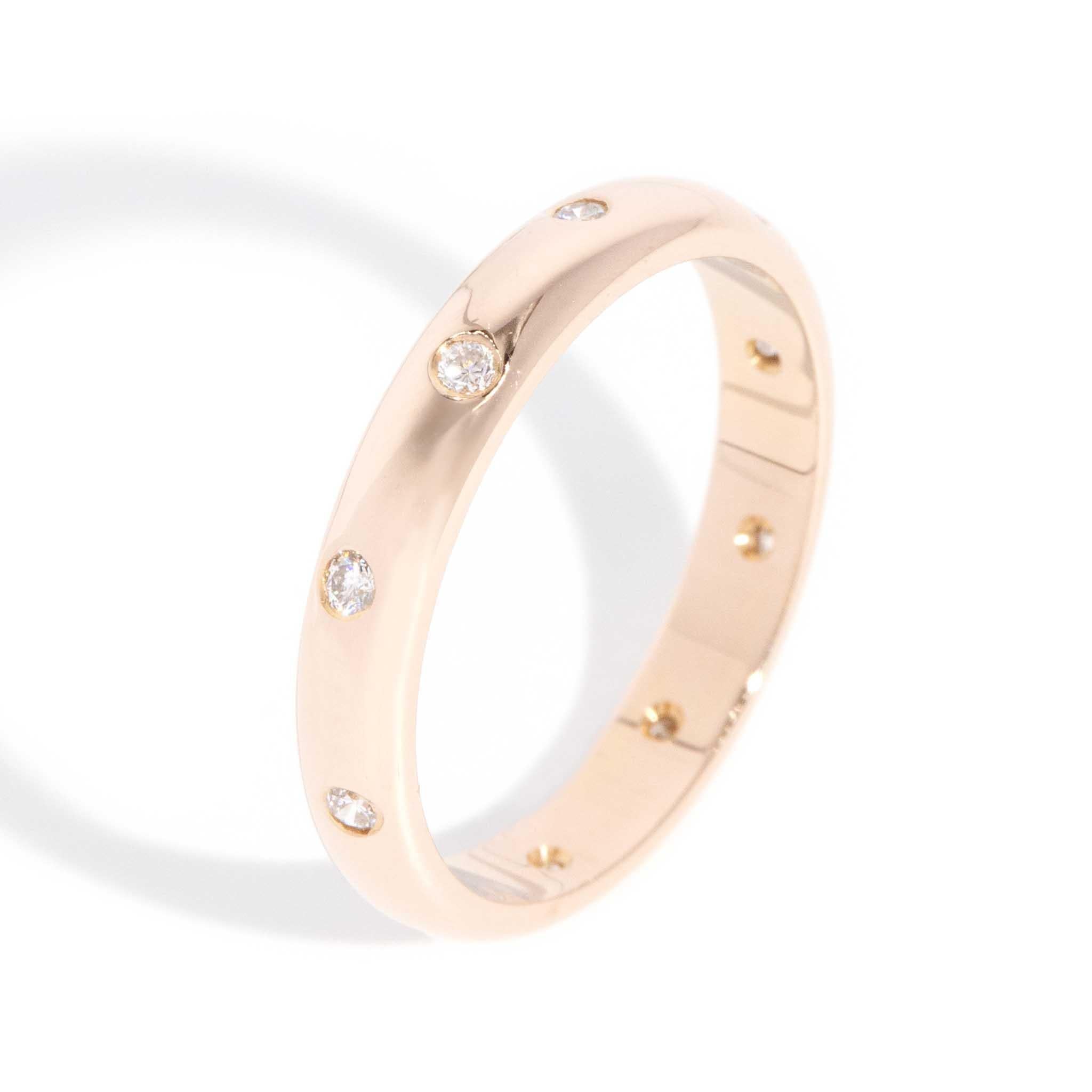Modern Vintage Circa 1980s Round Brilliant Diamond Hammer Set Band 18 Carat Rose Gold For Sale