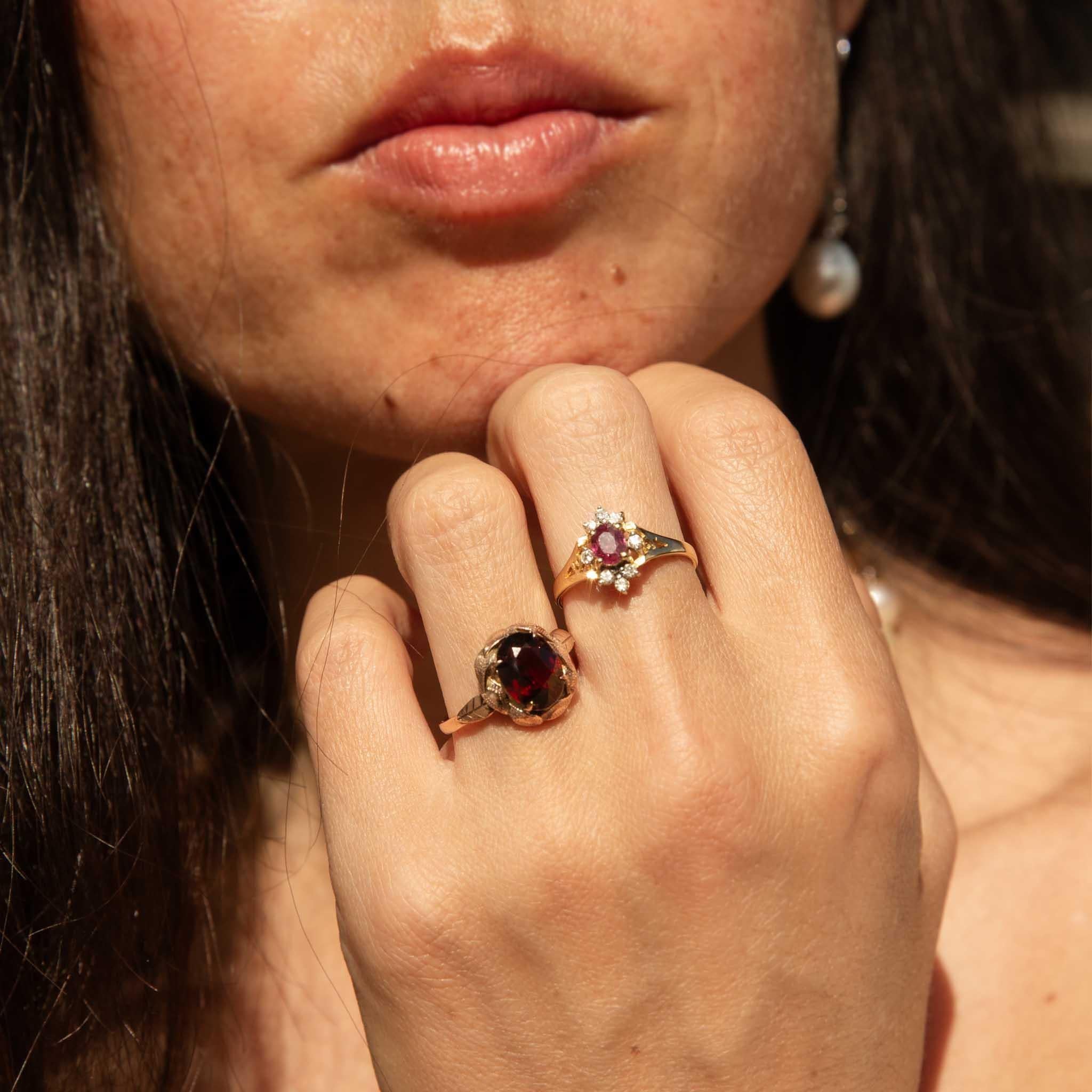 Our exquisite Adaline Ring is a captivating blend of elegance and romance. Her radiant ruby, set in a halo of sparkling diamonds, commands attention. Her 18ct yellow gold band, with its delicate scrollwork, adds a touch of vintage charm. A perfect