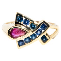 Vintage circa 1980s Sapphire & Deep Pear Cut Red Ruby 10 Carat Yellow Gold Ring
