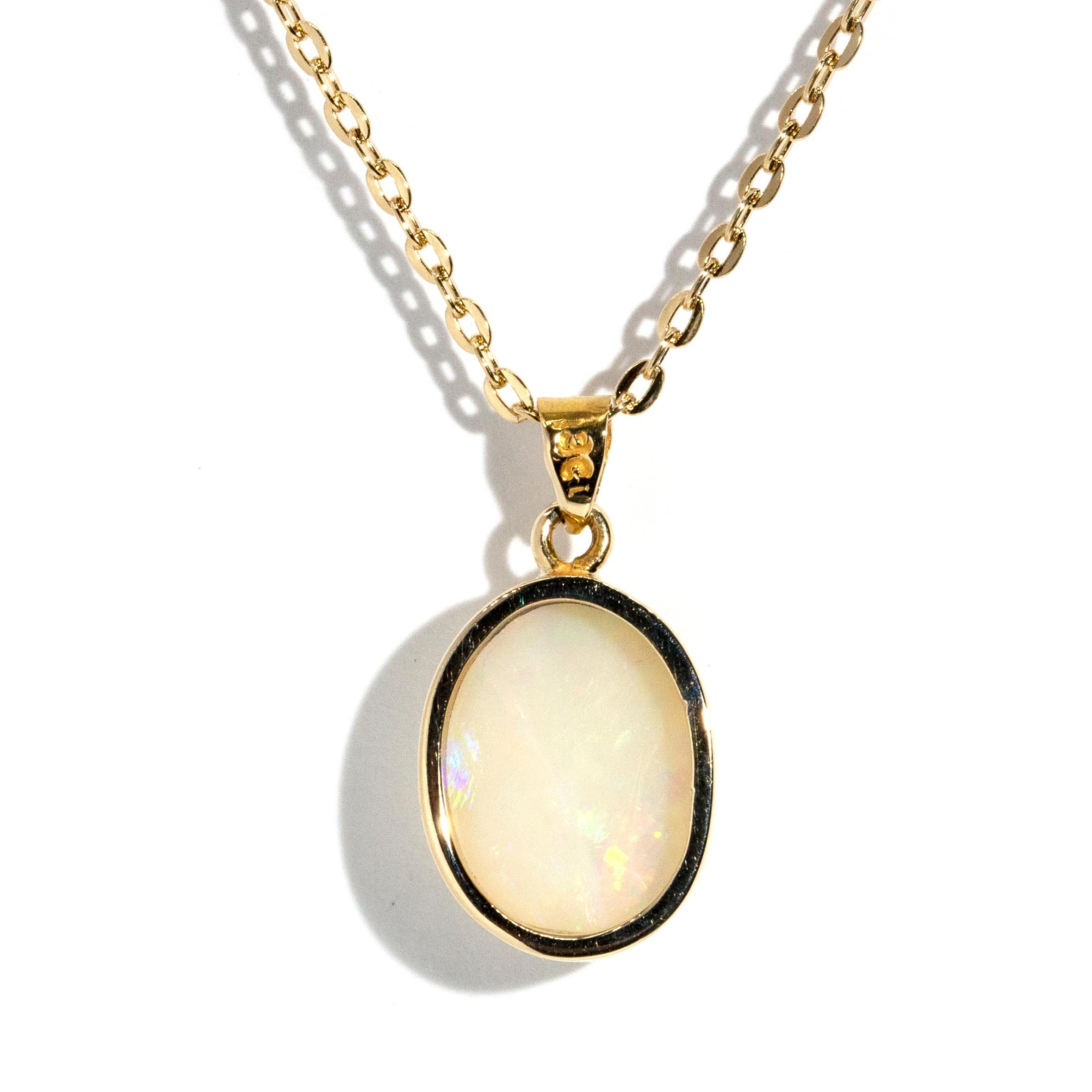 Modern Vintage Circa 1980s Solid Oval Australian Opal Pendant & Chain 18 Carat Gold For Sale