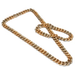 Vintage circa 1981, Pomellato 18 Karat Two-Tone Gold Necklace Two Bracelets Set