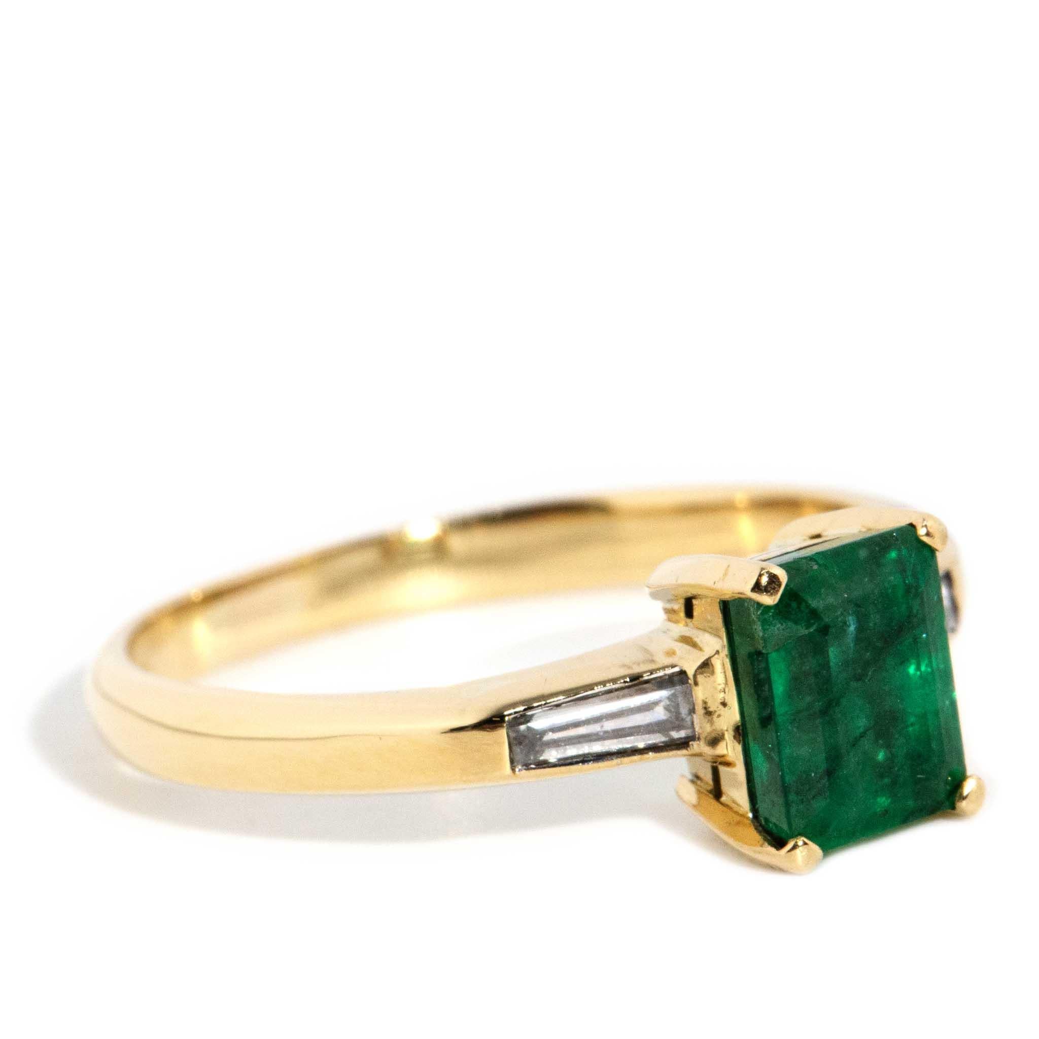 Modern Vintage Circa 1990s 1.04 Carat Emerald & Diamond Trilogy Ring 18 Carat Gold For Sale