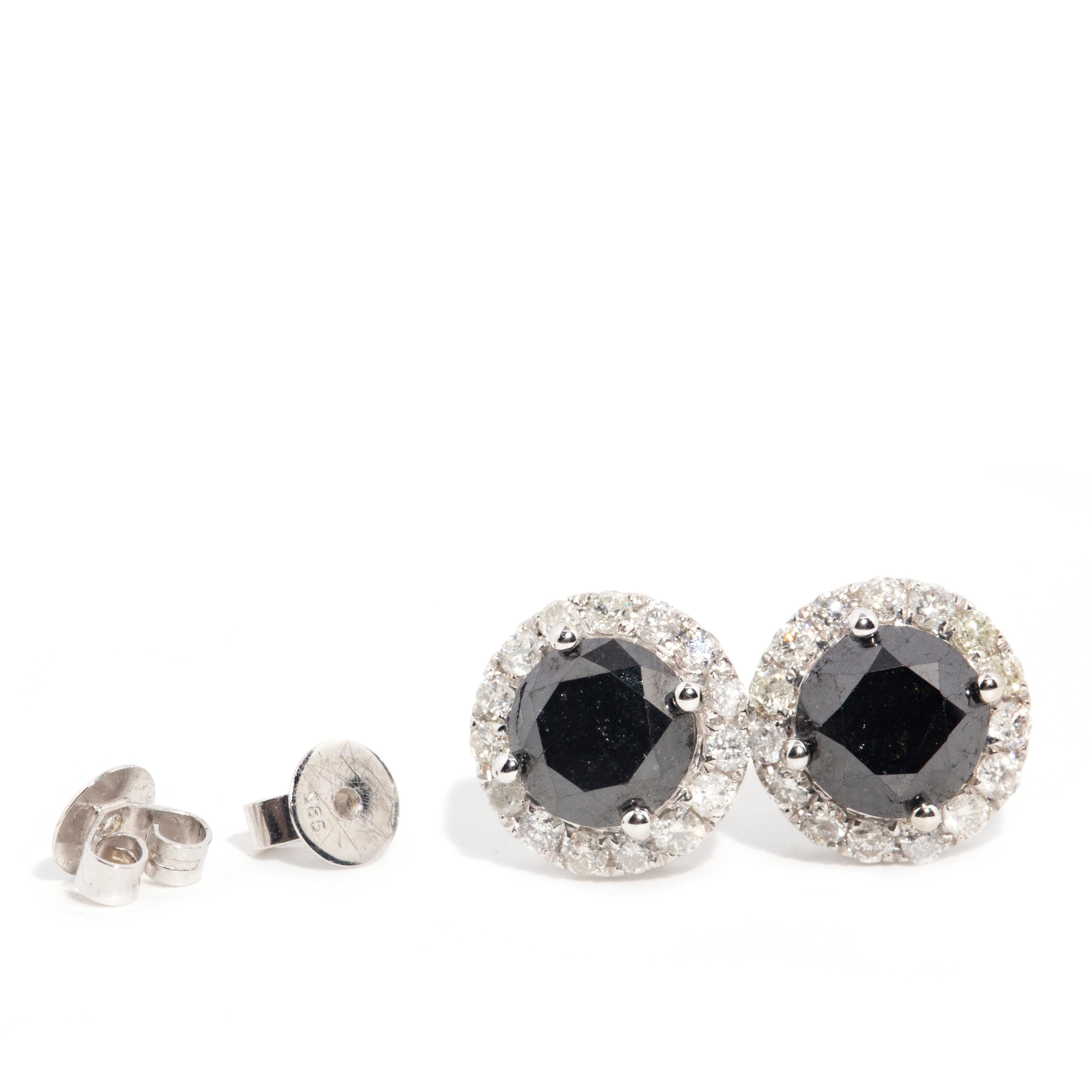 Round Cut Vintage Circa 1990s 14 Carat White Gold Black Diamond Halo Stud Style Earrings For Sale