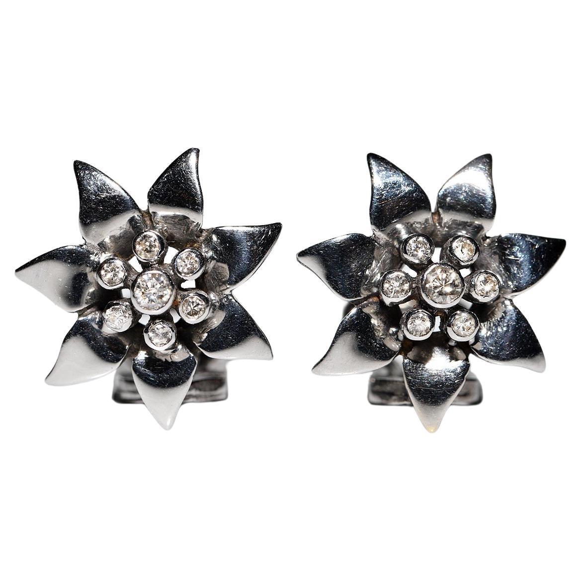 Orecchino d
epoca in oro 14k con diamante naturale decorato in stile foglia, CIRCA gli anni
90