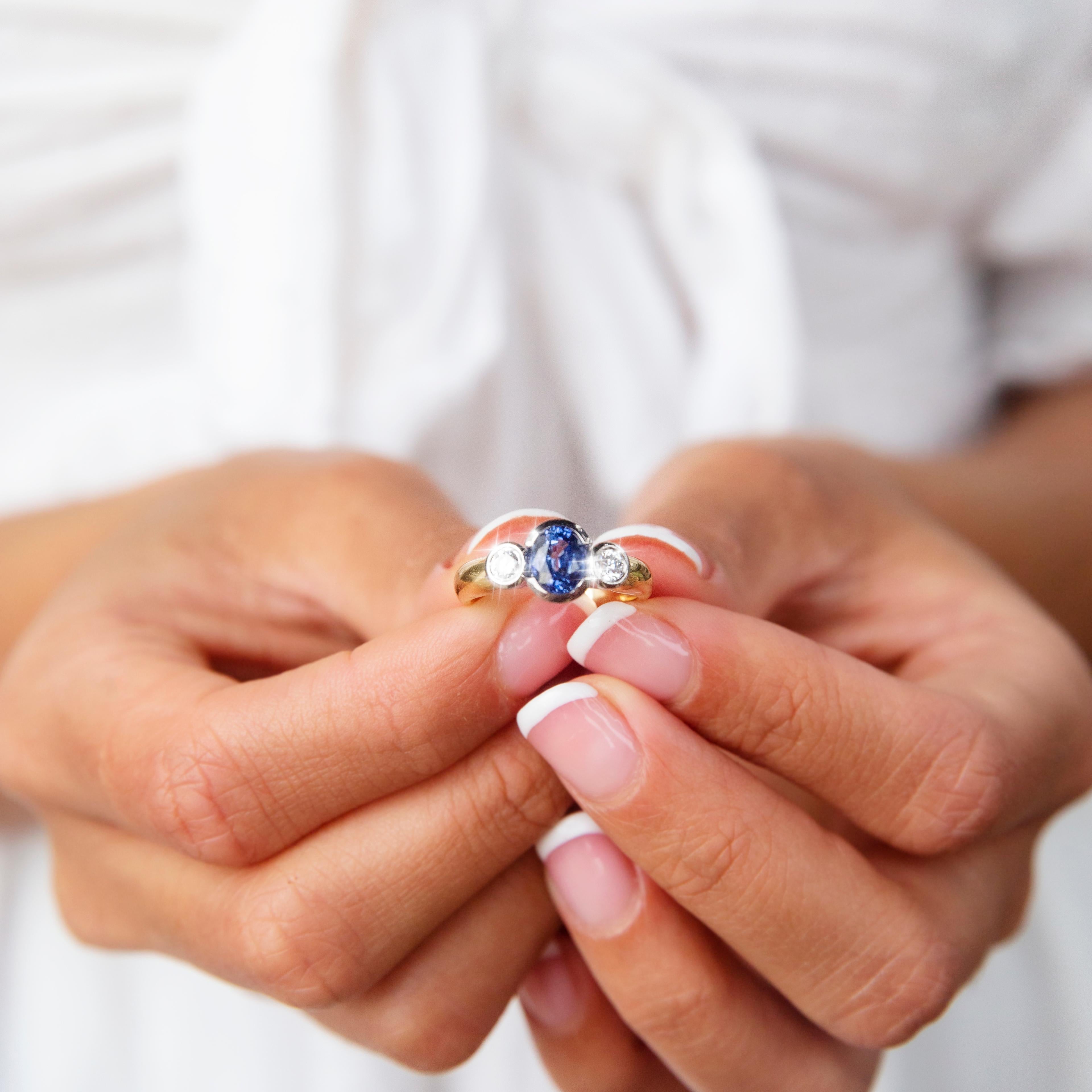 Vintage Circa 1990s 18 Carat Gold Oval Sapphire and Diamond Three Stone Ring In Good Condition In Hamilton, AU