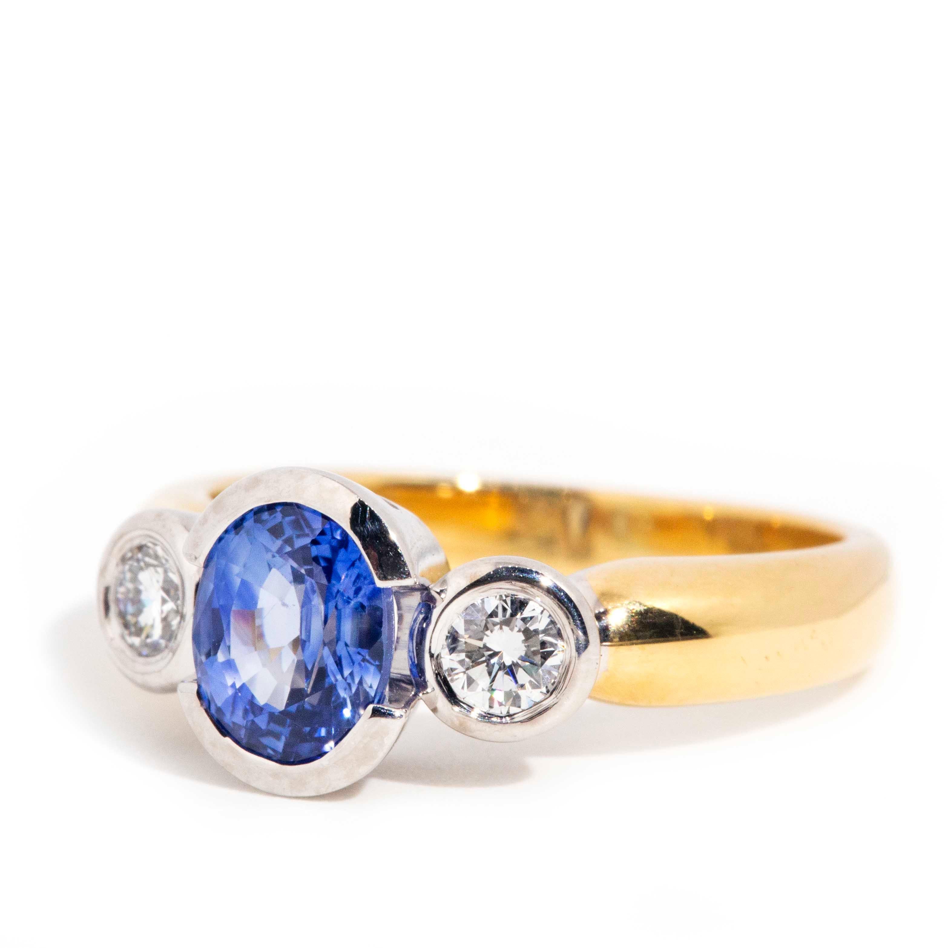 Women's Vintage Circa 1990s 18 Carat Gold Oval Sapphire and Diamond Three Stone Ring