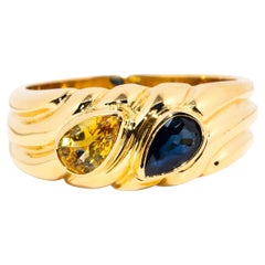 Vintage Circa 1990s 18 Carat Gold Yellow and Blue Teardrop Sapphire Grooved Band