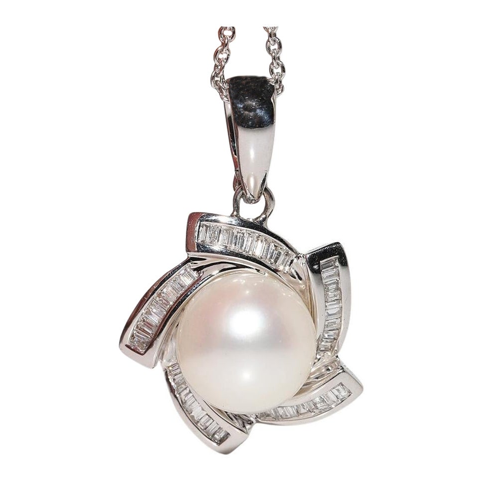 Ciondolo in oro 18k con diamanti naturali taglio baguette e perle, vintage, anni
90 circa.