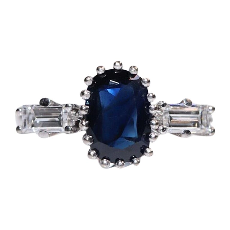 Vintage Circa 1990er Jahre Ring aus 18 Karat Gold mit Diamanten im natürlichen Baguetteschliff und Saphiren