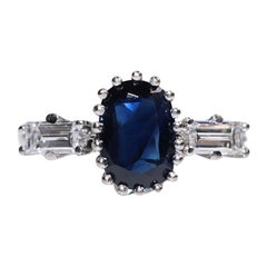 Vintage Circa 1990er Jahre Ring aus 18 Karat Gold mit Diamanten im natürlichen Baguetteschliff und Saphiren