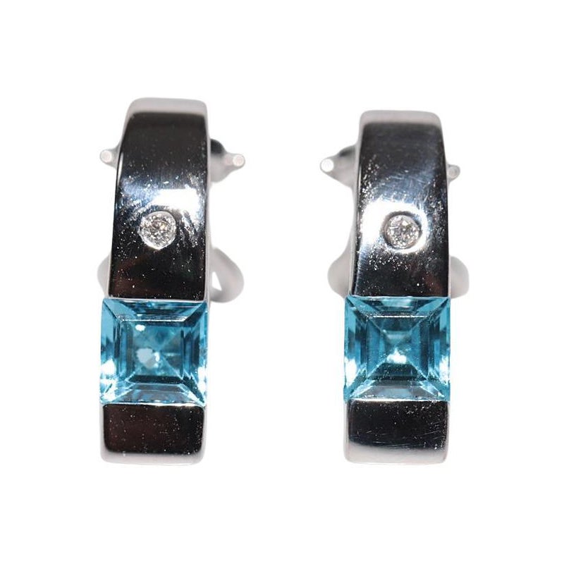 Orecchino d
oro naturale con diamante e topazio blu, vintage, anni
90, 18 carati