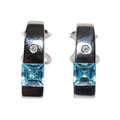 Orecchino d
oro naturale con diamante e topazio blu, vintage, anni
90, 18 carati