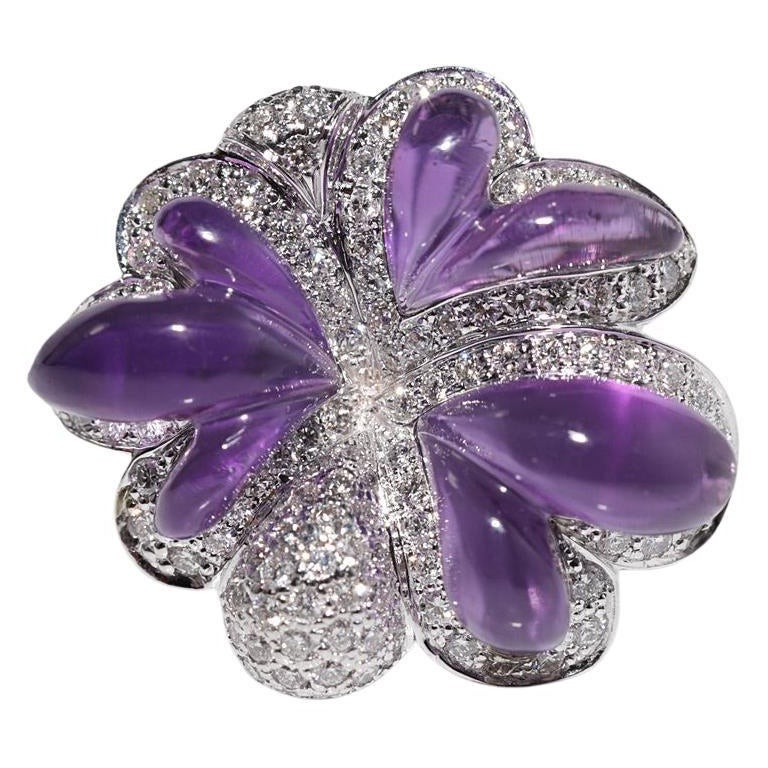 Anello vintage degli anni
90 in oro 18k con diamante naturale e ametista tagliata a cabochon