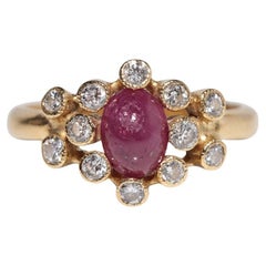 Anillo vintage circa años 90 de oro de 18k con diamante natural y rubí talla cabujón
