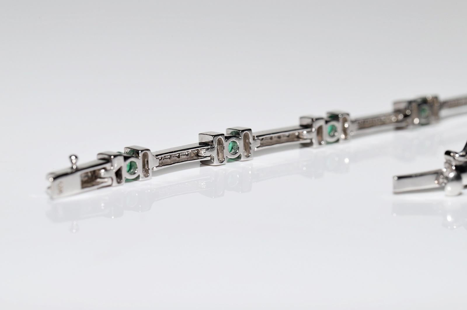 Vintage Circa 1990s 18k Gold Natural Diamond And Emerald Decorated Bracelet For Sale 6