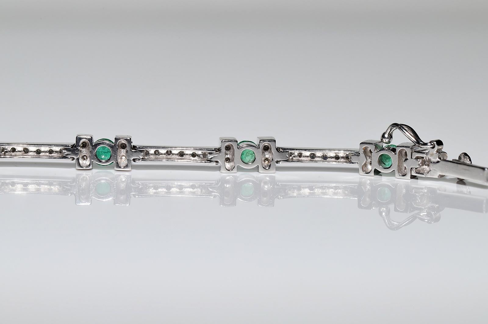 Vintage Circa 1990s 18k Gold Natural Diamond And Emerald Decorated Bracelet For Sale 7