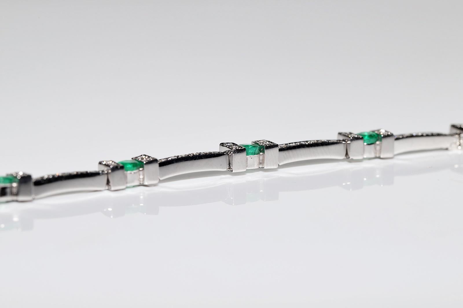 Vintage Circa 1990s 18k Gold Natural Diamond And Emerald Decorated Bracelet For Sale 9