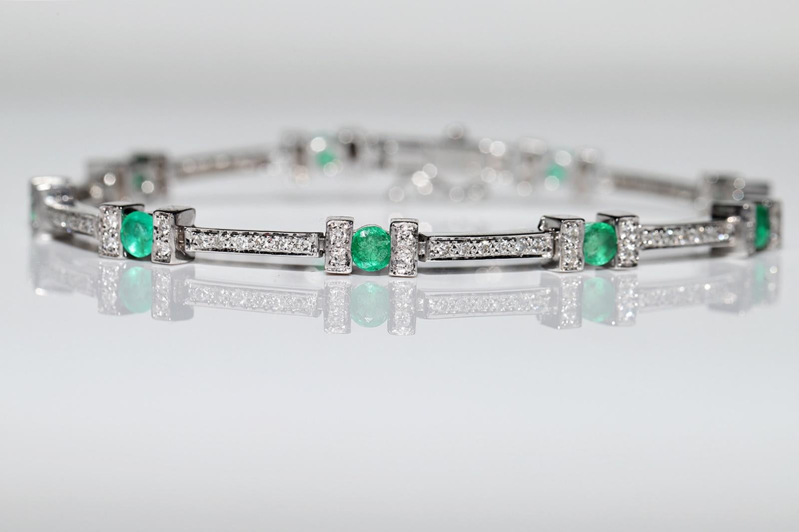 Vintage Circa 1990s 18k Gold Natural Diamond And Emerald Decorated Bracelet For Sale 1