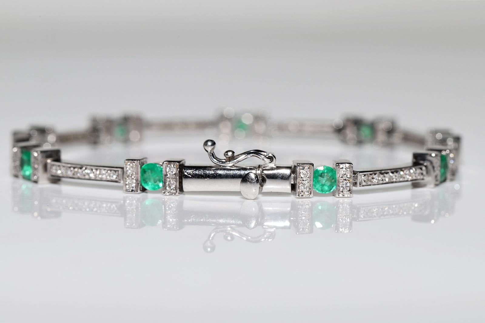 Vintage Circa 1990s 18k Gold Natural Diamond And Emerald Decorated Bracelet For Sale 3