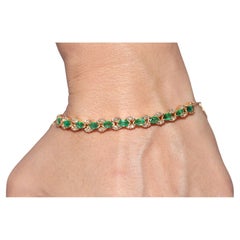 Vintage Circa 1990s 18k Gold Natural Diamond And Emerald Decorated Bracelet