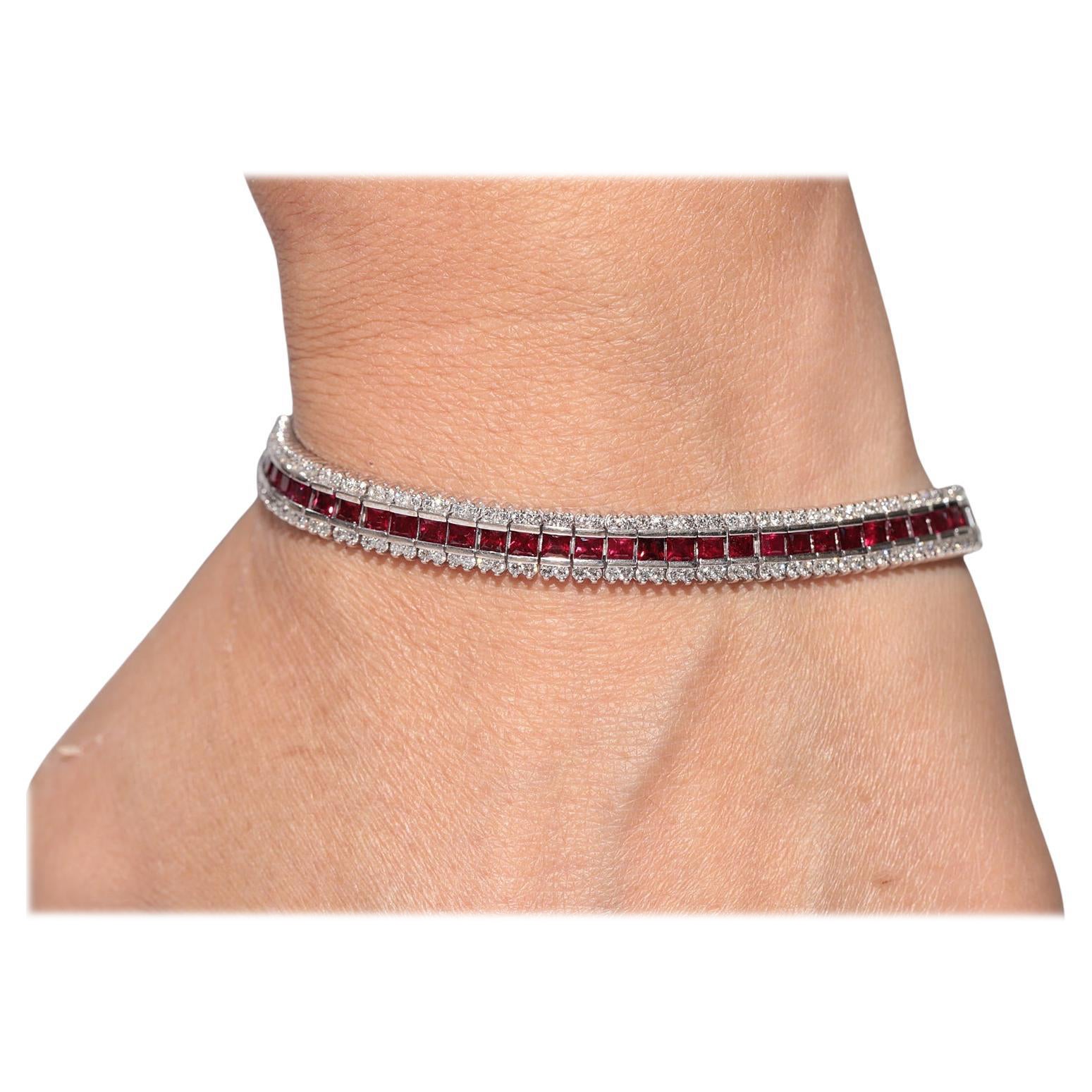 Pulsera vintage circa años 90 de oro de 18 quilates decorada con diamantes naturales y rubíes naturales