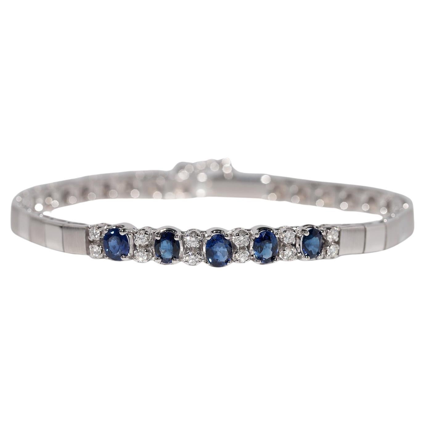 Vintage Circa 1990s 18k Gold Natural Diamond And Oval Cut Sapphire Bracelet For Sale